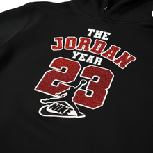 Load image into Gallery viewer, Close-up of Jordan Year 2023 custom embroidery detail on hoodie